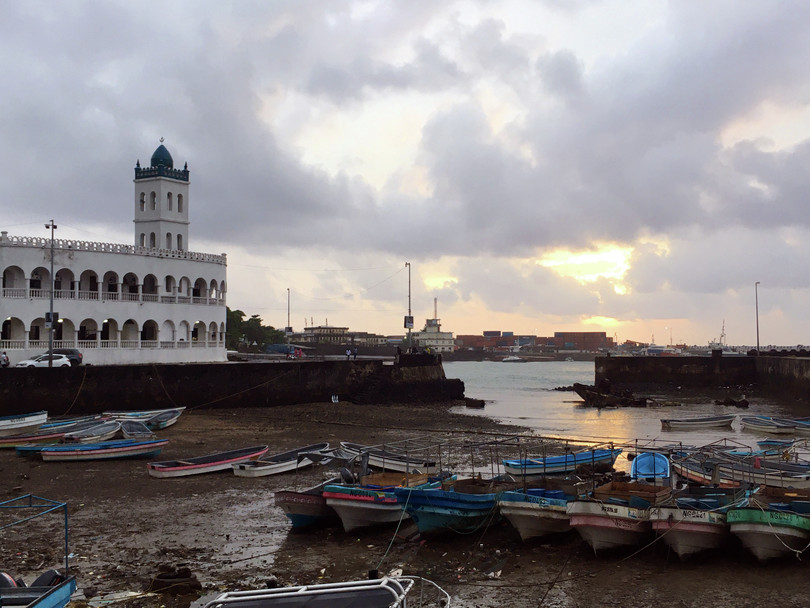 Locally constructed fishing boats, known as ‘kwassa kwassa’, docked in the port of Moroni, Comoros.
