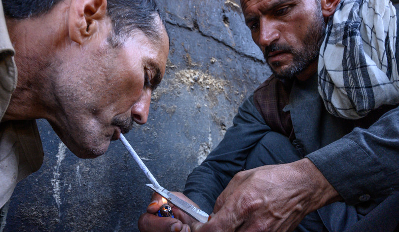 Men smoke crystal methamphetamine in Fayzabad, in the northern province of Badakhshan.

