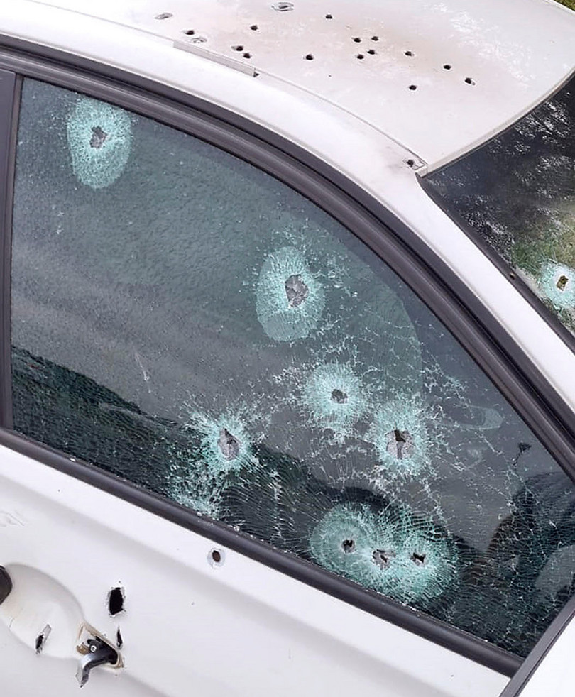 Bullet holes riddled the roof and window of the car in which Ernie ‘Lastig’ Solomon was killed.
