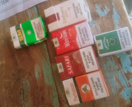 A selection of the cigarette brands produced by the Tanzania Cigarette Company (TCC), which are widely available at shops in Kenya. Kenya does not record large-scale imports of cigarettes from Tanzania, nor does TCC produce in Kenya, so the fact these cigarettes are widespread suggests a large volume of cross-border smuggling.
