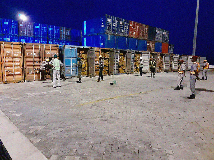 Mozambican authorities seize 82 containers of illegally felled timber bound for China at the port of Pemba, August 2020.
