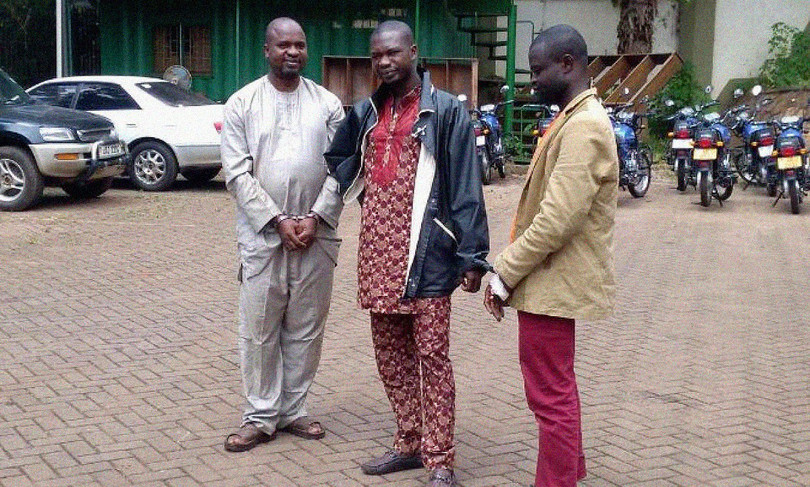 Wildlife trafficker Moazu Kromah and his sons upon their arrest in Kampala in 2017 (left); ivory seized from Kromah’s compound in Kampala (right).
