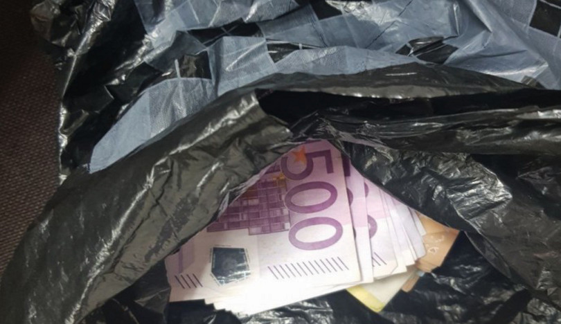 Banknotes to the value of €16 000 are hidden in a plastic bag in the cab of a truck heading for Kosovo seized at the Blace border crossing in North Macedonia, June 2020.
