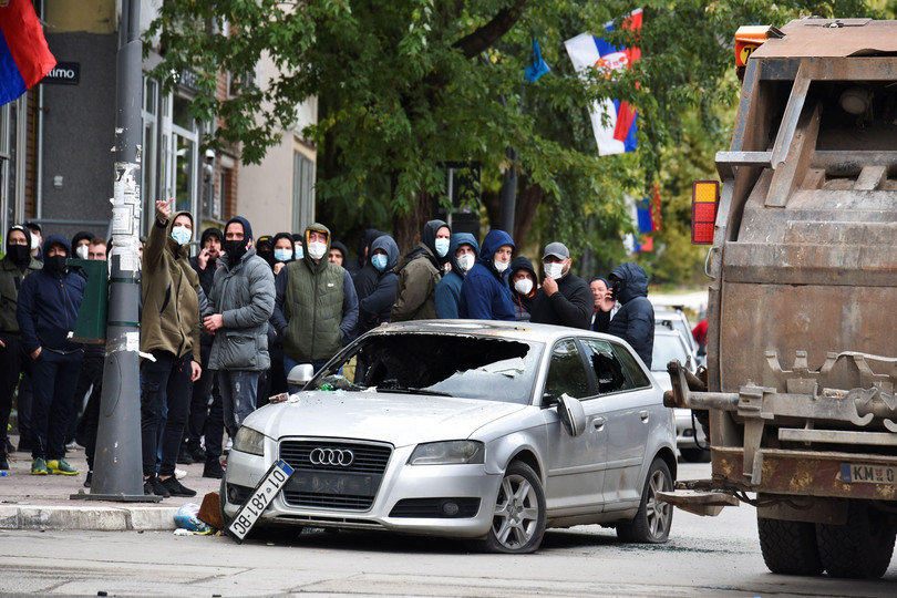 A damaged car following clashes between police and local protestors during an operation against the smuggling of goods, Mitrovica, 13 October 2021.
