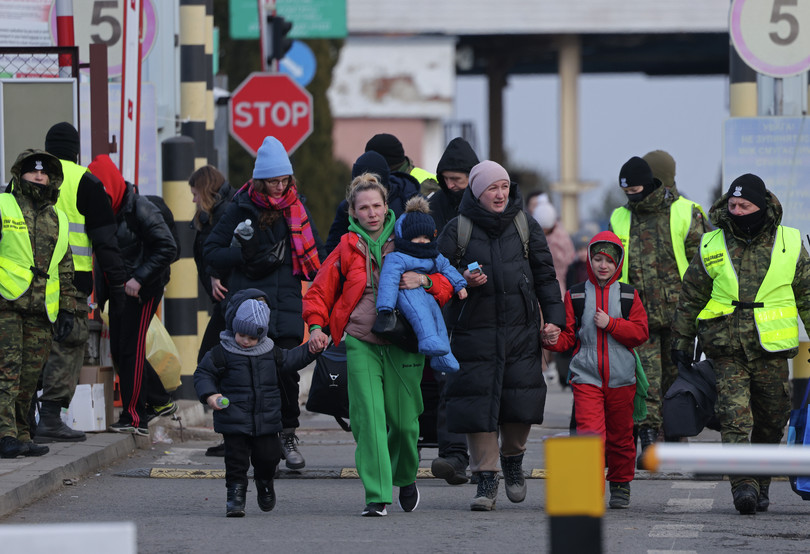 Ukrainian refugees cross into Poland, March 2022.
