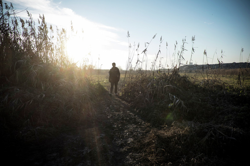 Migrants hide in the fields outside of Subotica, Serbia, while they make arrangements with smugglers or find routes into Hungary, an entrance to the European Union.