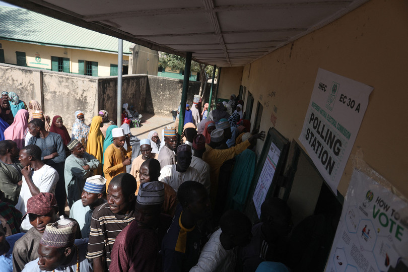Voters queue to cast their ballots at a polling station in Kano during Nigeria’s presidential and general election, February 2023.
